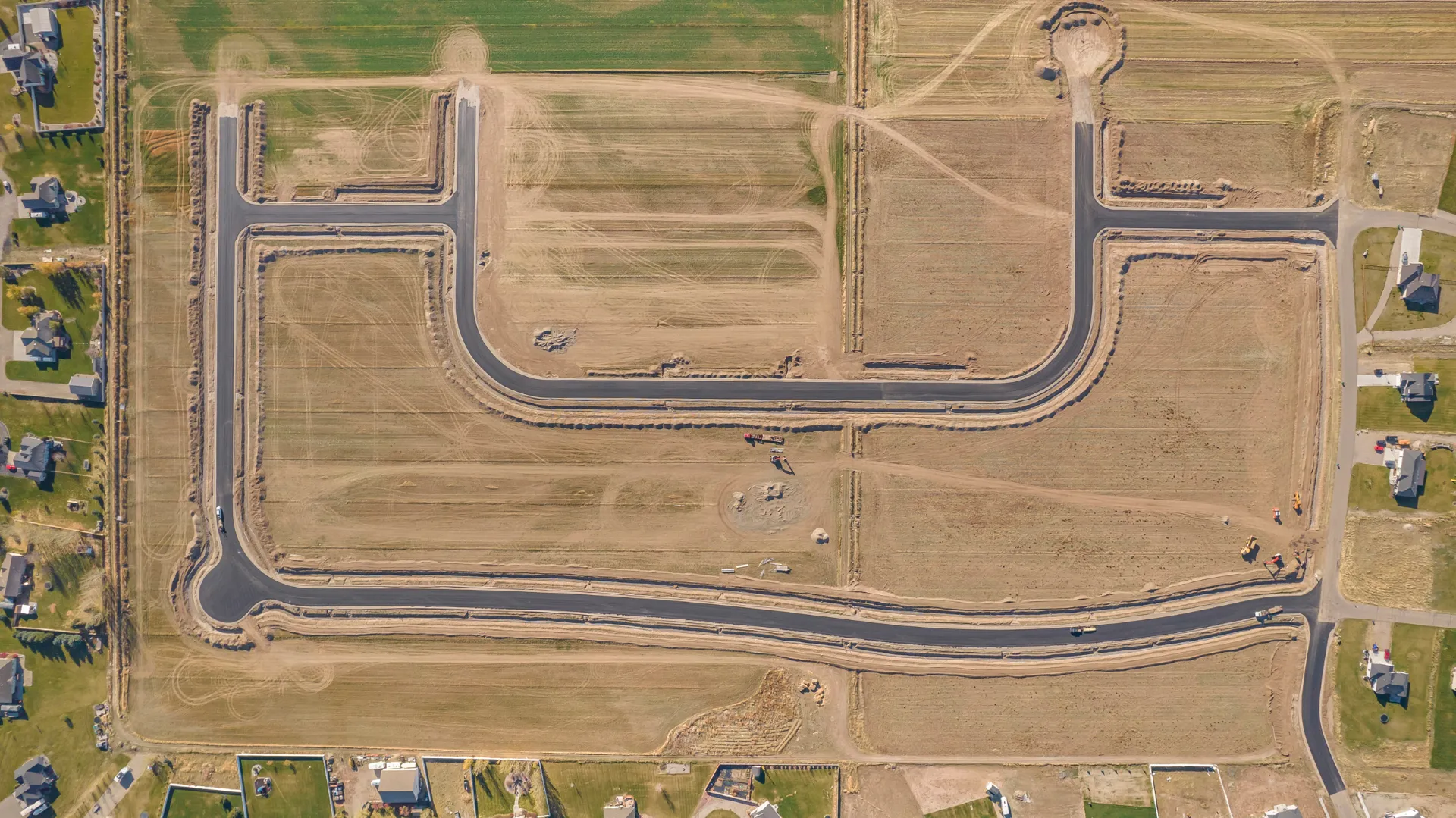 Aerial of paved roads and lot layout at Teton Heights in Rigby